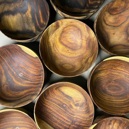 Orion rosewood bowl in hand showing size scale